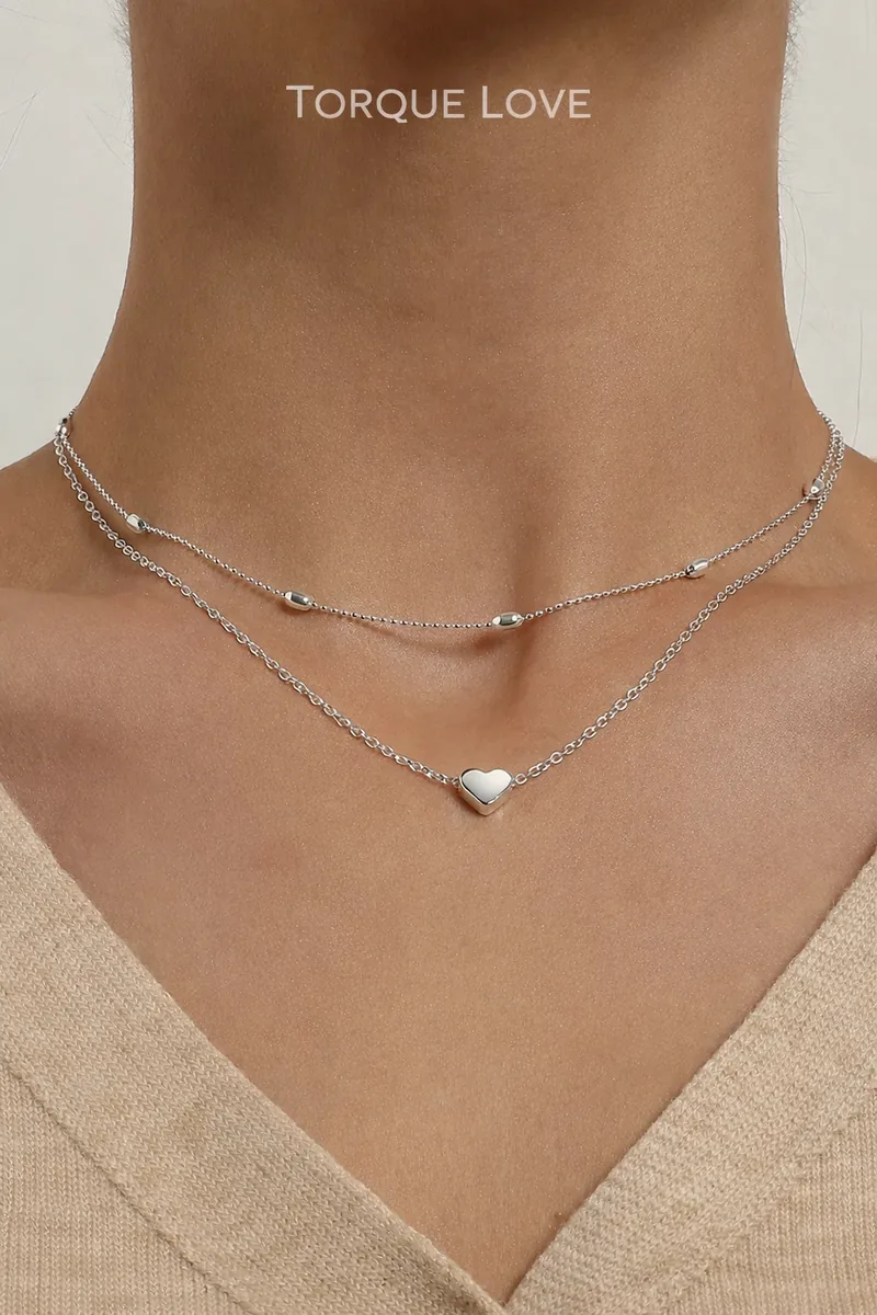 Women's neck chain in silver with a heart