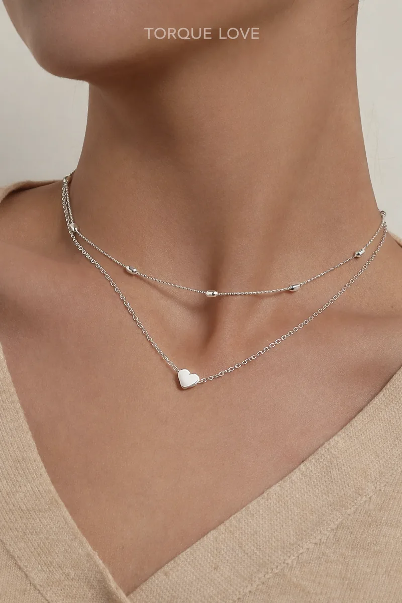 Women's neck chain in silver with a heart