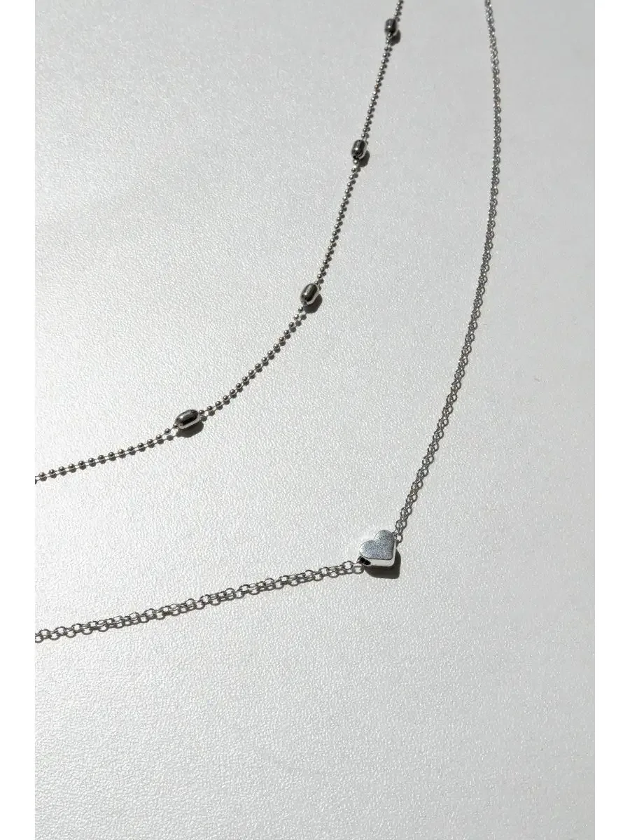 Women's neck chain in silver with a heart