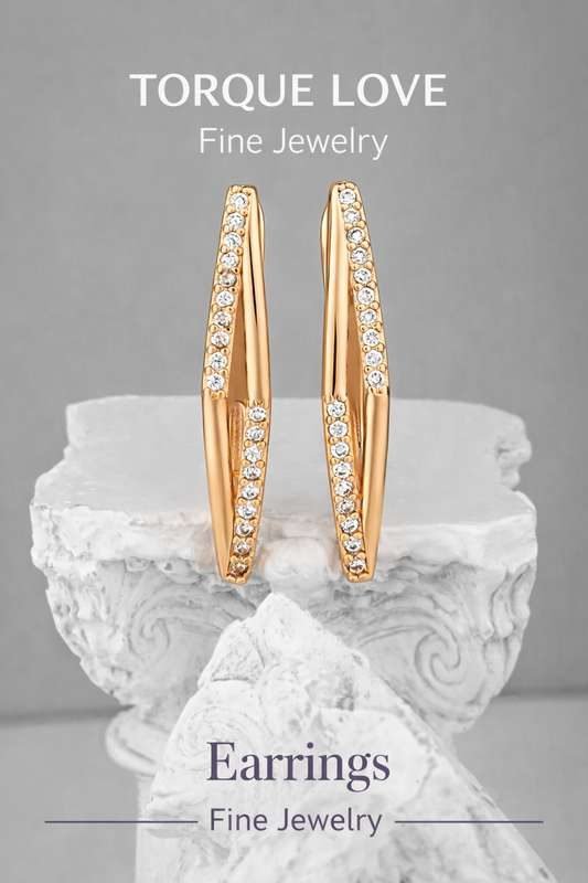 Long rhombus earrings with stones